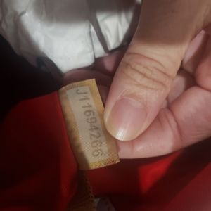 Additional photos of pale blue Dooney and Bourke